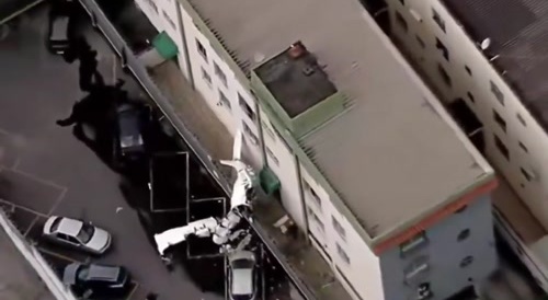 small plane hits a building