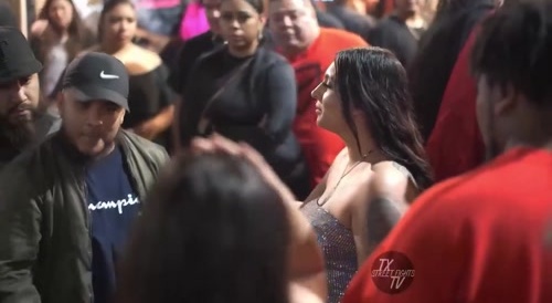 Two Guys Picking A Fight With Woman