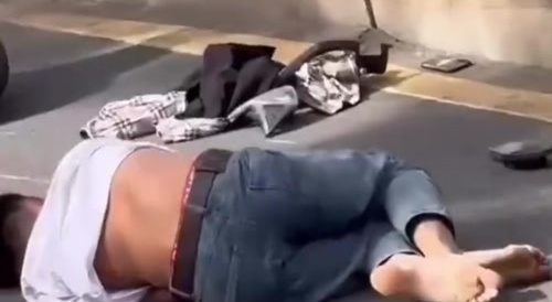 man pulls wheelie on a moped, fails miserably