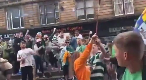 Woman with a firework blows up football fans