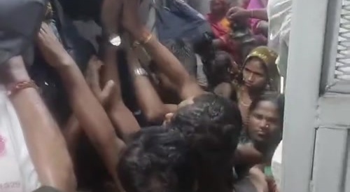 Inside an overcrowded indian general railway coach
