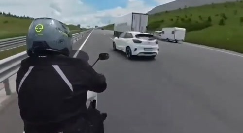 speeding biker taken out by clueless driver