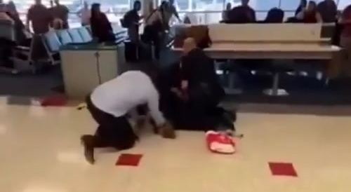 Airport Thug Fights Airport Cops