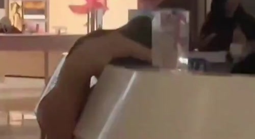 Woman naked in mall