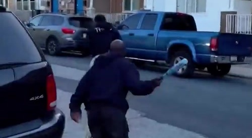 Urban Baseball Players Fight with Baseball Bats