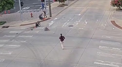Crazed Man Throws Molotov Cocktal at Wheelchair Man