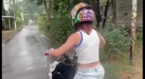 Woman Moped Driver