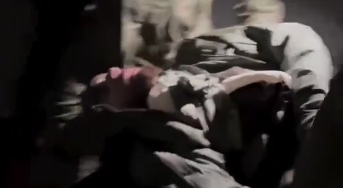 A russian soldier screams as both feet are torn off.