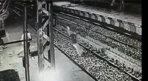 Man jumps in front of oncoming train