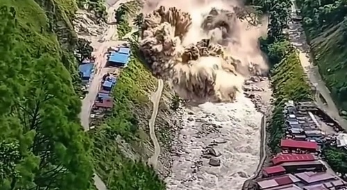 a mudslide demolishes a village