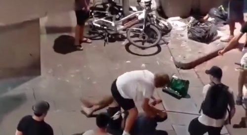 two men allegedly tried to rob an American tourist