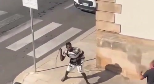 a violent man with a metal rod gets subdued
