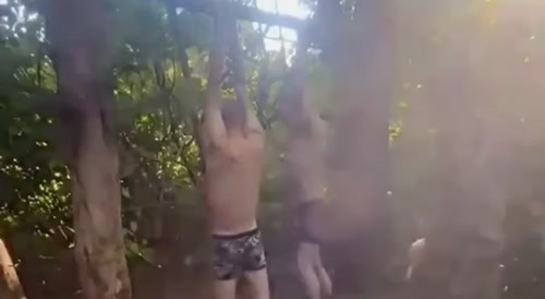 A Russian commander beats his subordinates.