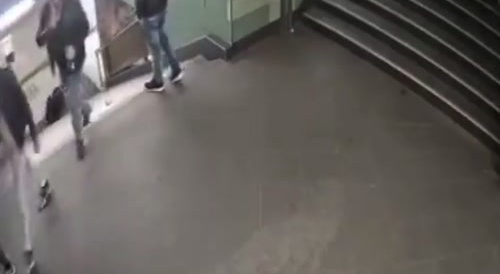 Man Pushes Woman in Germany