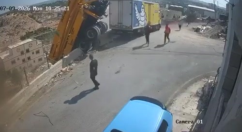Driver jumps out of truck, just in time..