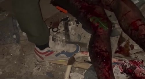 A bloodied russian screams with pleasure.