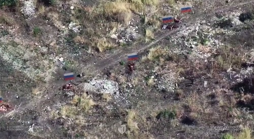 The road is strewn with the corpses of russian soldiers.