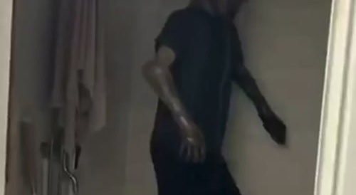 A man hangs his home