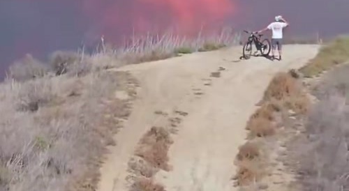 Lucky Bastard Escapes Wildfire That's About to Burn him Alive