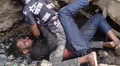 African sewage brawl