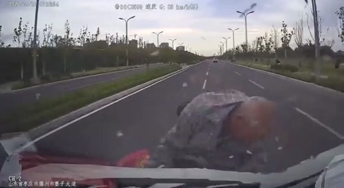 Truck Meets Bicycle In China