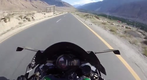 speeding biker goes for a short flight